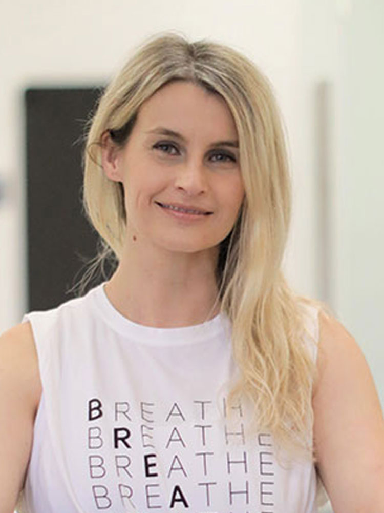 Romana - Owner and Pilates Instructor